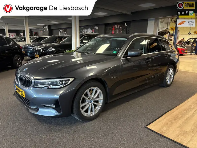 bmw-3-serie-touring-320e-business-edition-plus-leer-navi-trekhaak-orig-ned--dealer-onderhouden