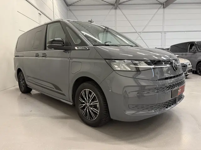 volkswagen-multivan-1.4-ehybrid-l2-bulli-edition-7p.-pure-grey-trekhaak-camera-acc-standkachel-carplay-navi-electr.a.klep-privacy-17-schuifruitjes-